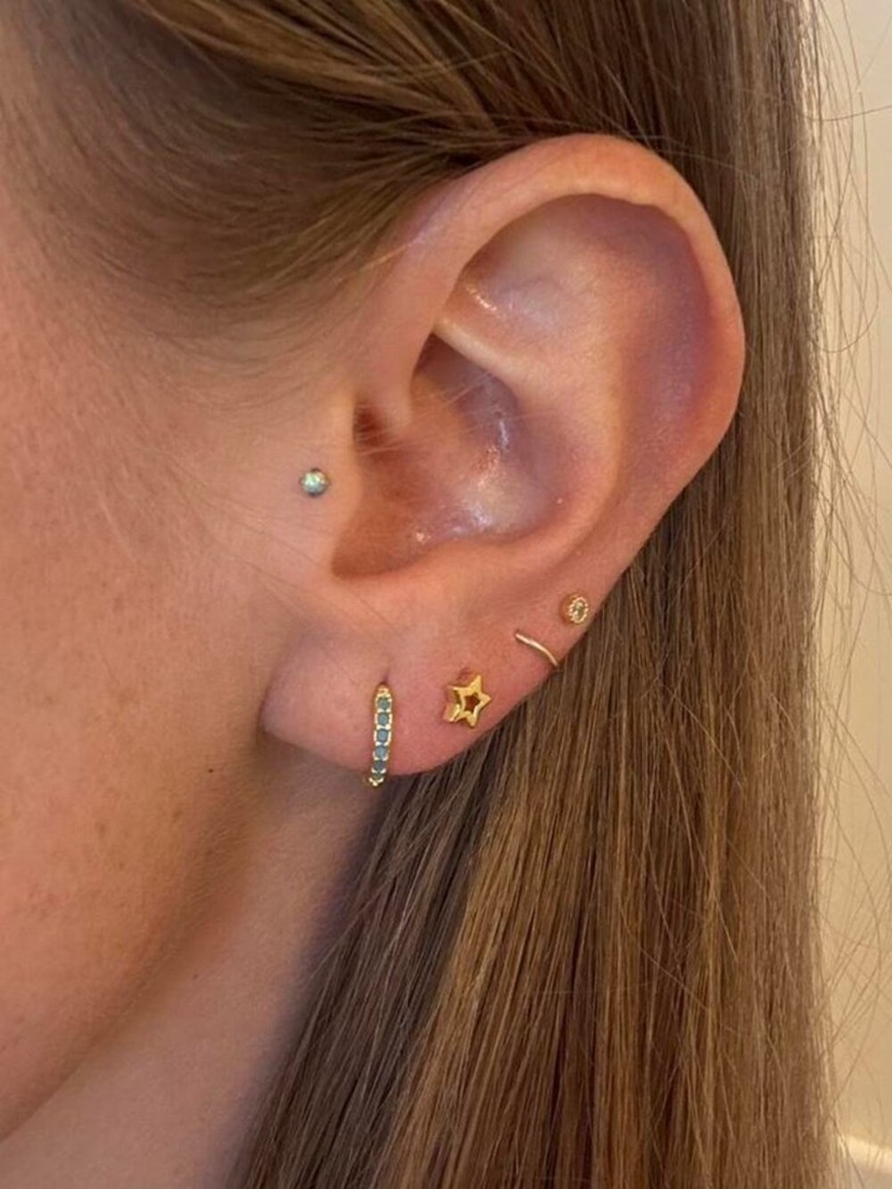 The Isla Gold plated sterling silver and turquoise blue hoops huggie hoop earrin